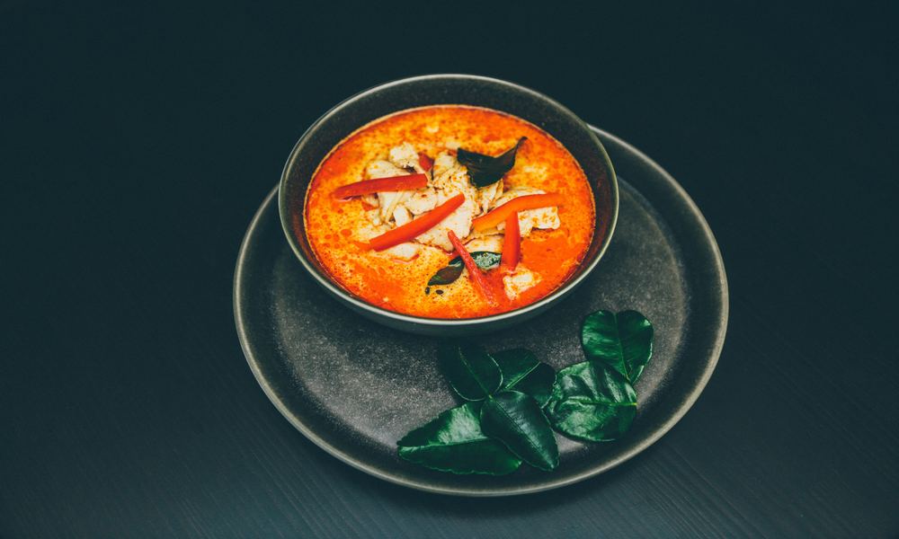 A red soup with hot peppers